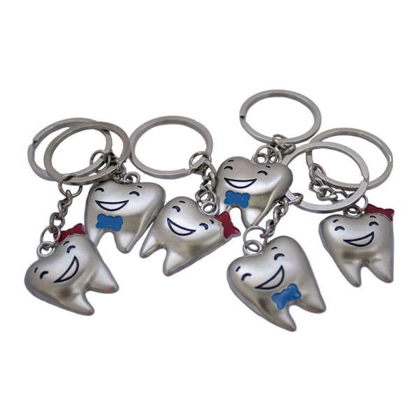 BADER Metal Molar Shaped Tooth Keychain, 20/Pk. Silver color with the shape of a smiling tooth