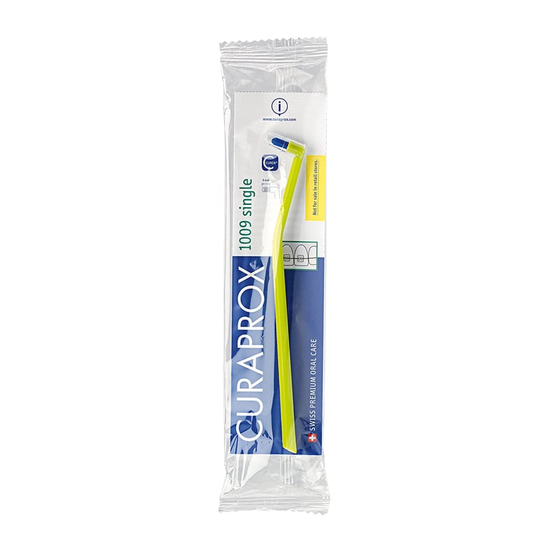 Curaprox CS 1009 Single-Tuft Toothbrush, 1/Pk. Features small round head and ergonomic handle
