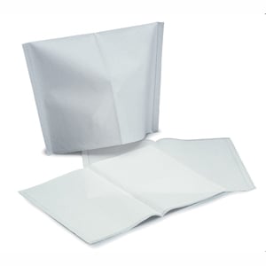 Quala 10" x 13" White Polycoated Headrest Covers. Manufactured from soft facial tissue combined